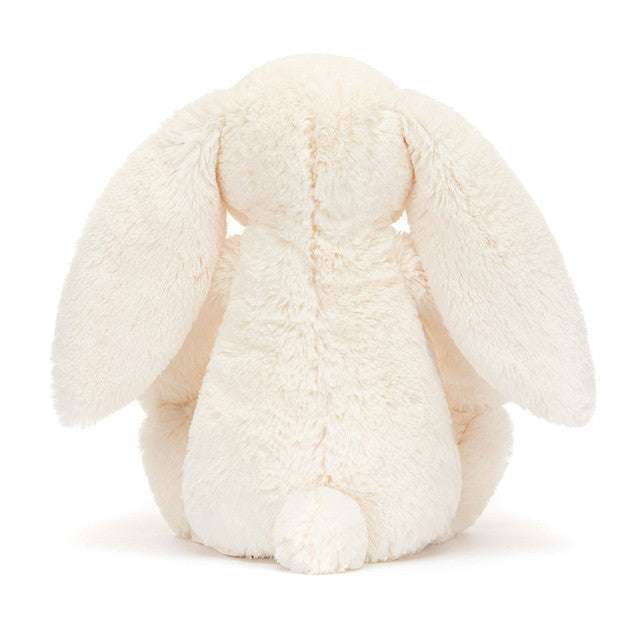 Jellycat Blossom Cream Bunny "Berry" medium plush toy with soft cream fur and adorable floral design, suitable for children.