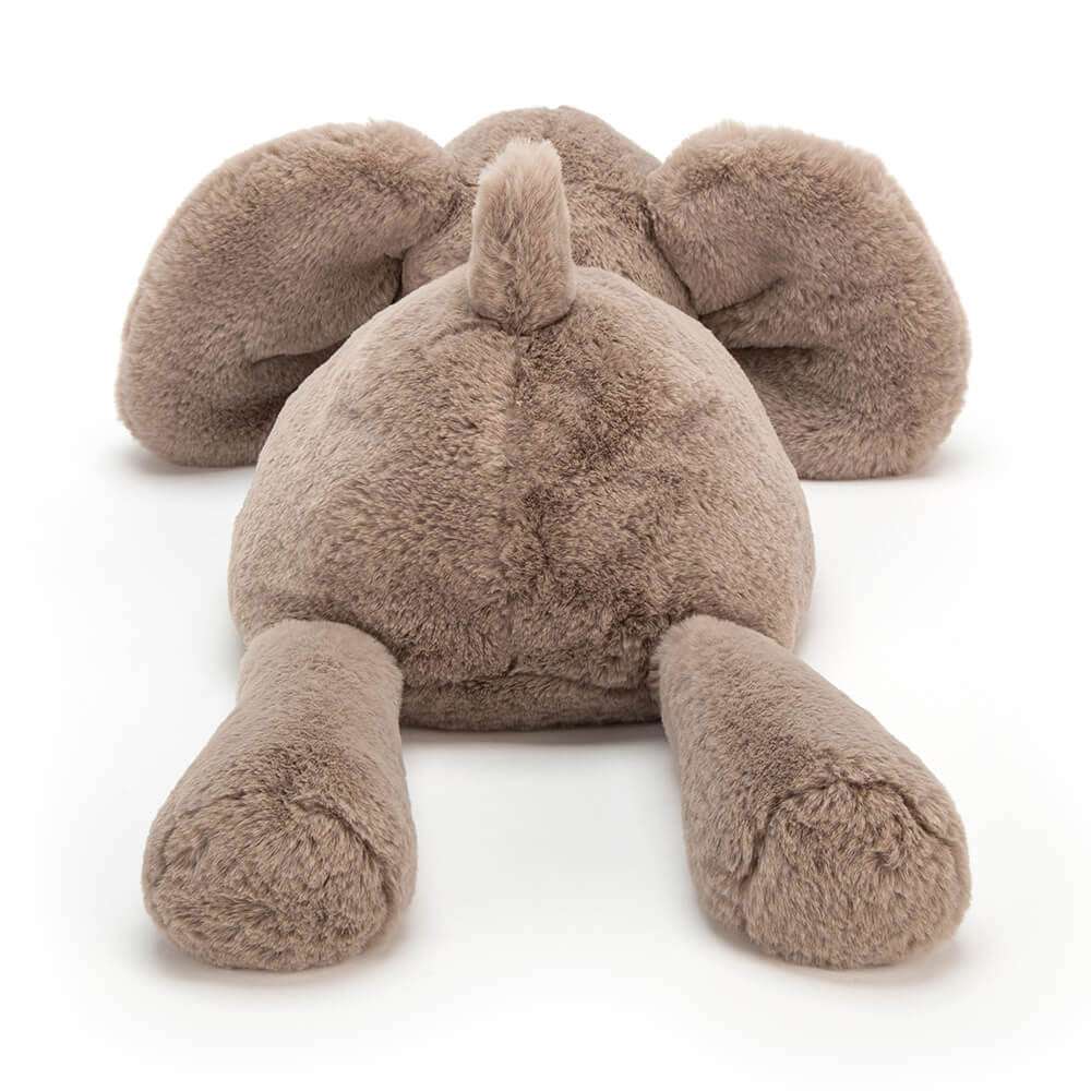 Tiny Smudge Elephant plush toy by Jellycat, featuring soft fur and floppy ears, perfect for playtime and cuddles.